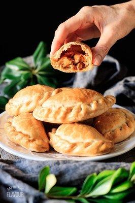 Empanadas Argentinas Gourmet, ready to aet or frozen. More than 15 flavors.