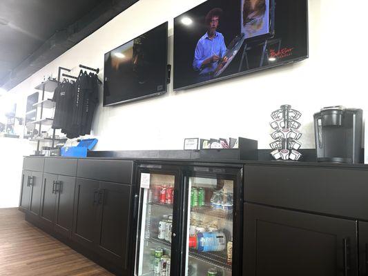 Merch, beverages, and screens