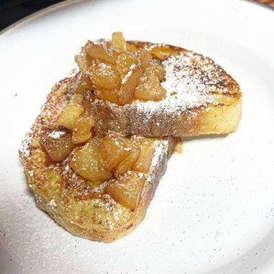 2 piece order of French toast made with our house-made bread, with a some of our apple compote on top