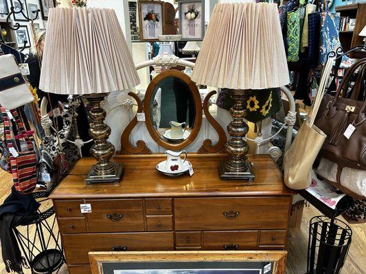 Maple dresser with brass lamps