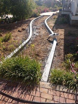 Curbing for pavers in place