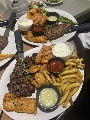 Duet of Coconut Shrimp and KC steak with a piña colada dipping sauce
