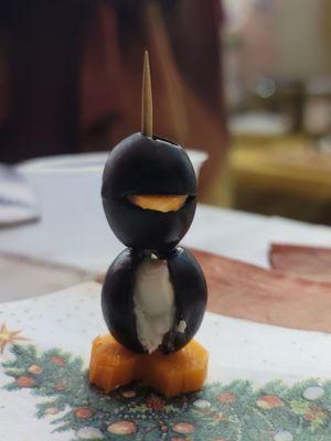 Cute little penguins: olives with cheese
