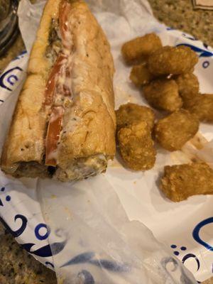 OG Classic (chopped cheese sandwich). You can't really tell but the meat and cheese was cooked together. The tots aren't bad either.