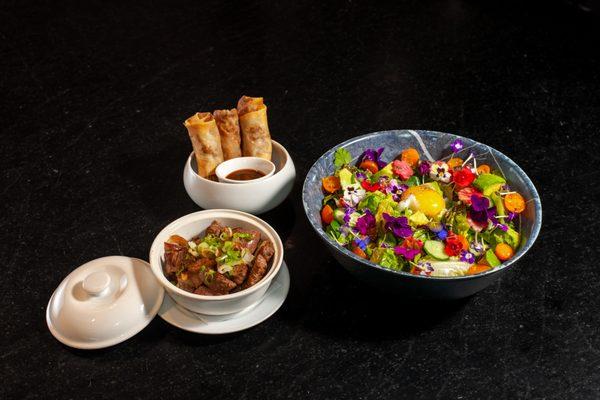 Shaking beef salad and duck egg rolls.