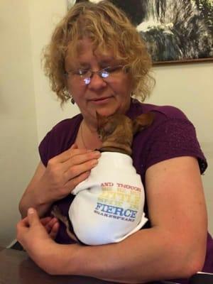 My assistant, Zuza, is sporting a gift from a client. It is a t-shirt that says "She may be but little, but she is fierce."