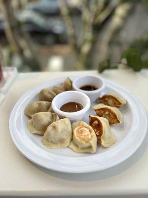 Pork cabbage dumplings that are pan-fried for that crispy bottoms.
