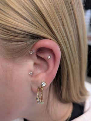 Flat Helix and Forward Helix piercings at this visit