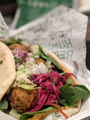 Pita with falafel and fresh greens