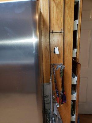 Had to cut counter top tile and above cabinet to fit a larger refrigerator in.