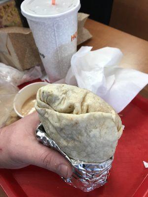 Spicy Chicken Burrito, large drink, chips and queso.