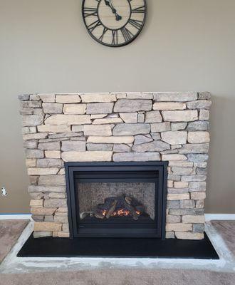 Cozy finish. (Note: I'll update once our custom mantle is installed).