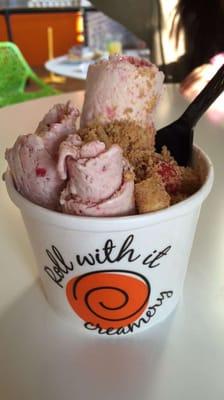 Strawberry shortcake with graham cracker, cheesecake bites, and strawberry toppings