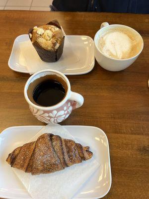 Strawberry cheesecake muffin with tres leches coffee Chocolate croissant with Mexican cafe de olla