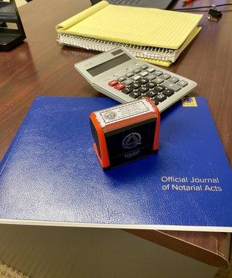 Notary journal & seal. Remember we offer mobile notary services as well!