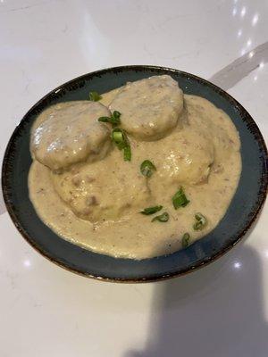 Biscuits and gravy included two eggs.