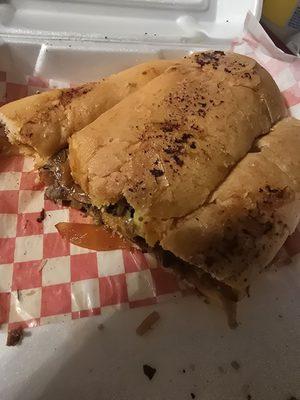 Half eaten barbacoa torta