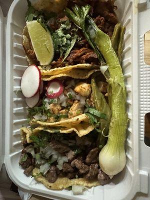 Taco Al Pastor, Chicken & Steak with the included extras.