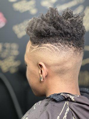 Children's mid fade with freestyle design