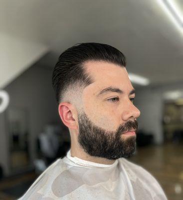 Mid Skin Fade with Slicked Back Top & Straight Razor Beard Lining