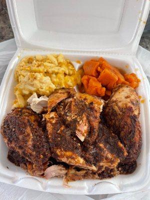 Jerk Chicken Over Rice And Peas With Mac And Yams.