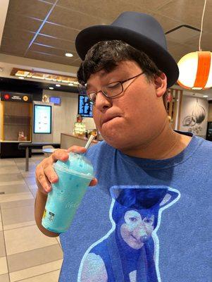 Me drinking the blue slushy. I like to think it's Sonic's doodie