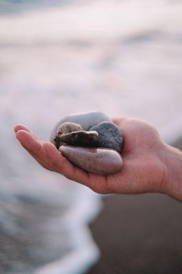 Hand open with stones