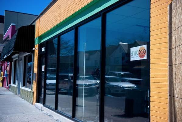 Located in the StylePod building. Free Public Parking garage right behind building.