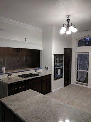 Kitchen after- wall opened. Electric stove converted to gas