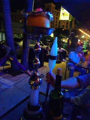 Our grapefruit head with blue mist and an ice hose and the bottle of Cabernet... # hookahwin #hookahinnlounge