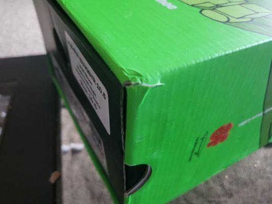 Corner tear from stretching the box to put skate tool in, instead of shipping together in a larger box.