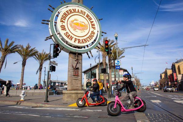 Fat Tire scooters in Fishermans Wharf. Each rental has GoRide storytelling tour w/ GPS guided routre to the Golden Gate Bridge.