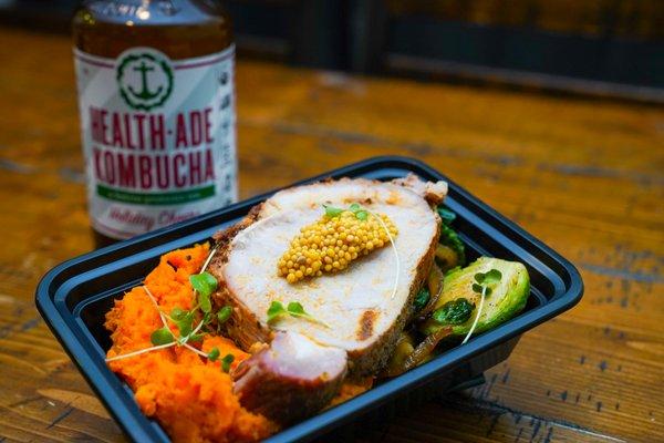 Roasted Pork Loin: Mashed sweet potato, roasted Brussels sprouts, pickled mustard seed