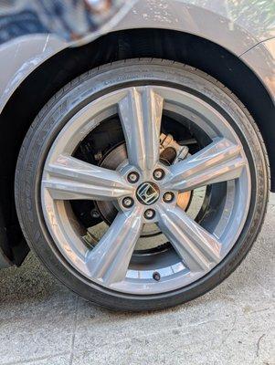 My newly painted rims that match the color of the car. So sporty looking!