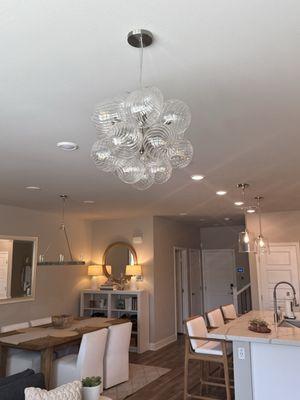 Alex hung two chandeliers, repaired a pendant, hung a mirror, rehung wall art, fixed a sliding door.