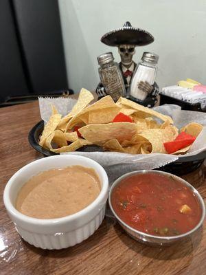 Complimentary cheese/bean dip, salsa and chips