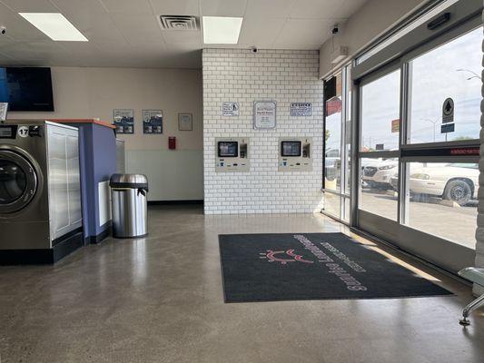 Washers, Bill and Card machines has different languages for you to choose from if English isn't your first language.