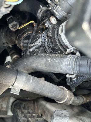 Before photo of dirty hoses, leaks and some corrosion...