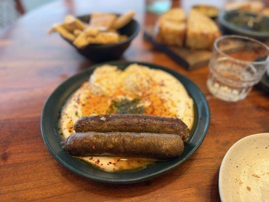 Turkish eggs and lamb sausage