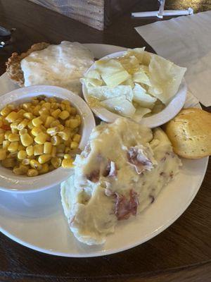 Country fried steak with white gravy, red skinned mashed potatoes, Fire roasted corn, cabbage and corn muffin
