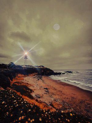 Dark and windy day, but the light from the light house breaks the darkness, gives lights to the world and guides the ships to safety