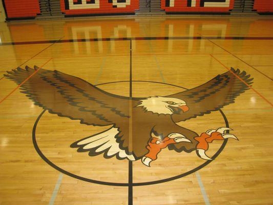 Gymnasiums are our specialty including both logo work, lettering and game lines.