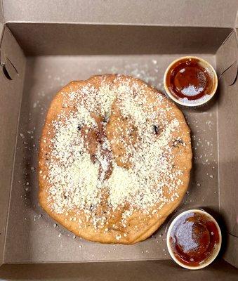Garlic Parmesan savory fried dough with marinara sauce for dipping