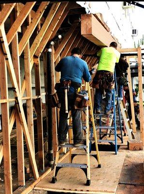 Replacing a damaged structural beam in an apartment building