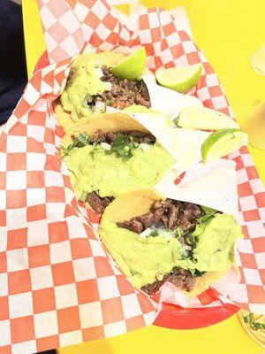 Carne Asada tacos - comes with a huge spoon full of guacamole