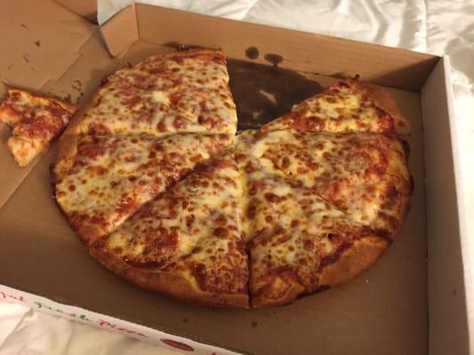 A medium pepperoni pizza with extra cheese from Westside Pizza Delivery. It tastes exactly as bad as it looks.