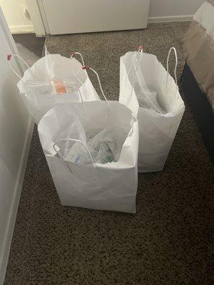 Med supplies tossed into paper bags