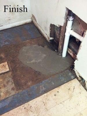 Pipe covered and re-concrete to create finished look