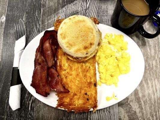 "Half" order: 4 nice pieces of bacon, a lot of egg, English muffin and a huge plank of perfectly crispy hashbrowns.