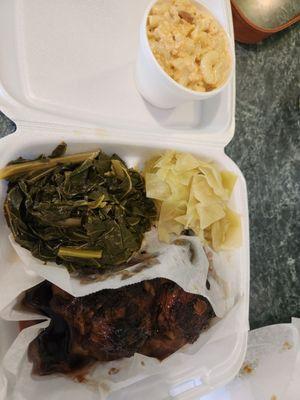 Bourbon Chicken, Smothered Pork Chop, Cabbage, Collard Greens, Mac & Cheese